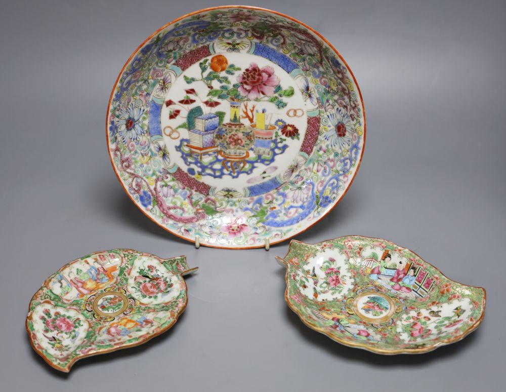 A Chinese enamelled porcelain saucer dish, 25cm, and two Canton leaf dishes, 19cm and 18cm